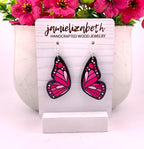 Love Is Like a Butterfly Earrings – Dolly Pink, large, shown in black wood
