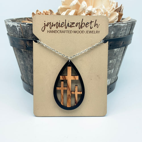 Olivewood Triple Cross framed in Black Wood