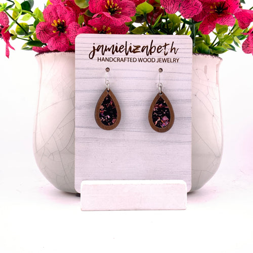 Pink flecks against a black background, teardrop earrings with Walnut wood frames by Jamielizabeth