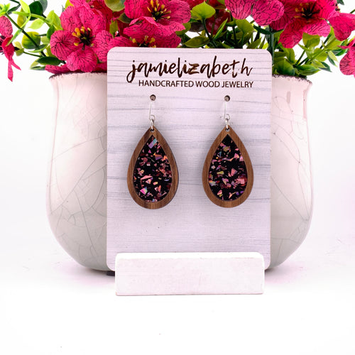 Pink flecks against a black background, teardrop earrings with Walnut wood frames by Jamielizabeth