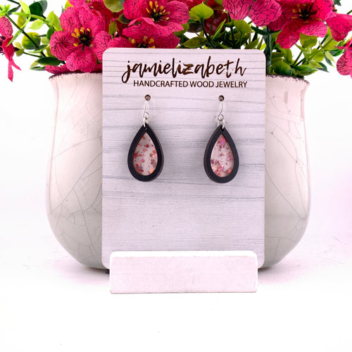 Pink flecks against a white background, teardrop earrings with Black wood frames by Jamielizabeth