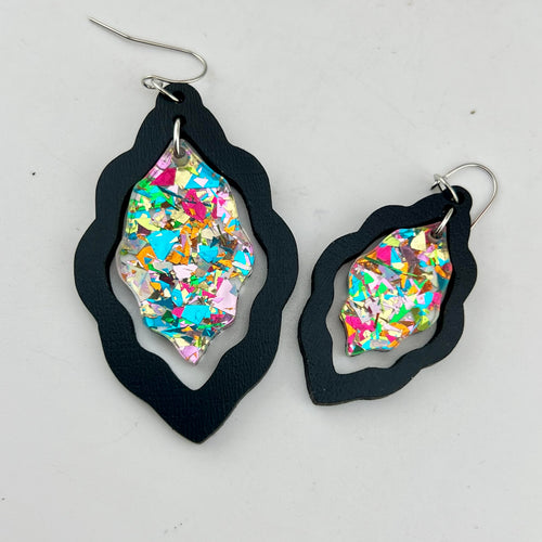 Confetti Dangles Scallop Earrings shown in black wood